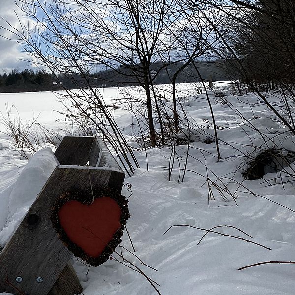 A paper heart hangs over the Gramwick Trail in Jaffrey 