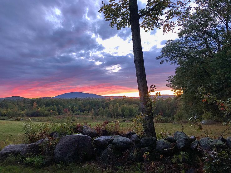 Conserved land with Mount Monadnock on horizon at sunset