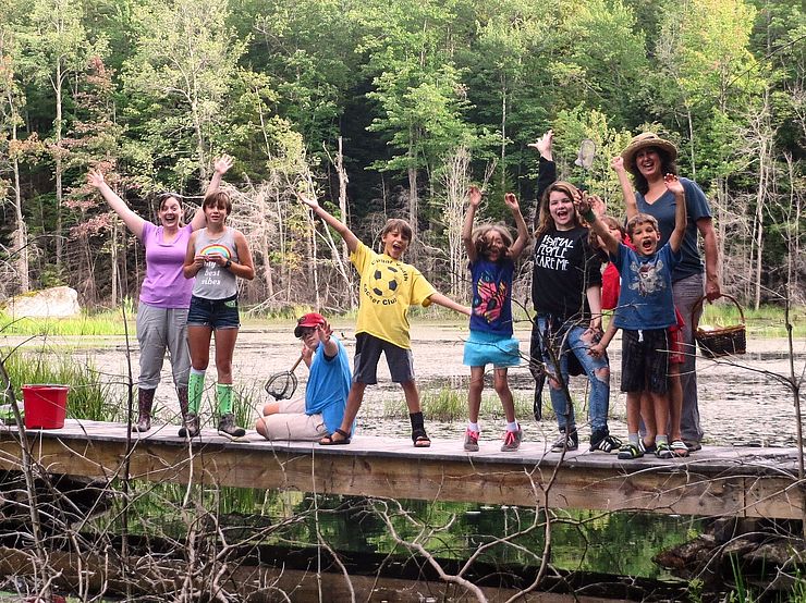Group of kids on small footbridge