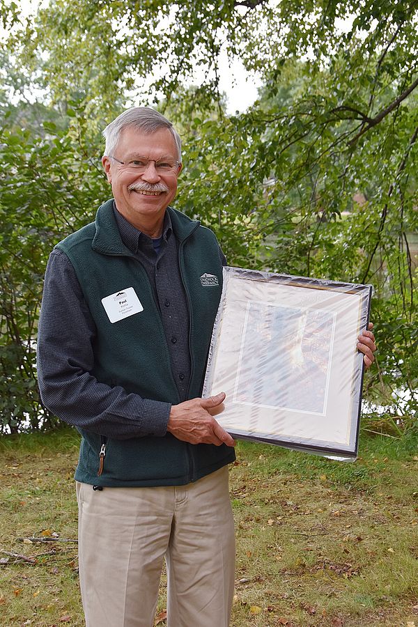 Paul Kotila showing off his award