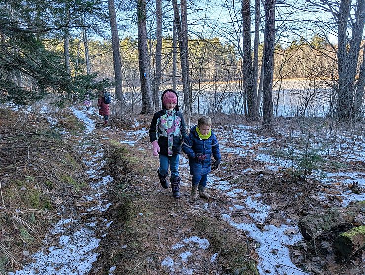 Children walking a trail in Jaffrey NH