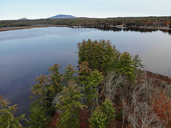 Aerial view of Sip Pond peninsula and Mount Monadnock on the horizon