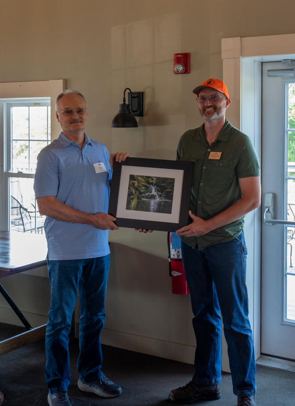 Norman Hassel receiving a 2022 Conservation Award